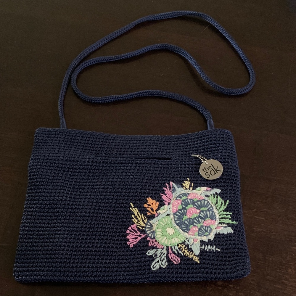 The Sak Navy Crochet Crossbody Bag with Multicolor Floral Embroidery
